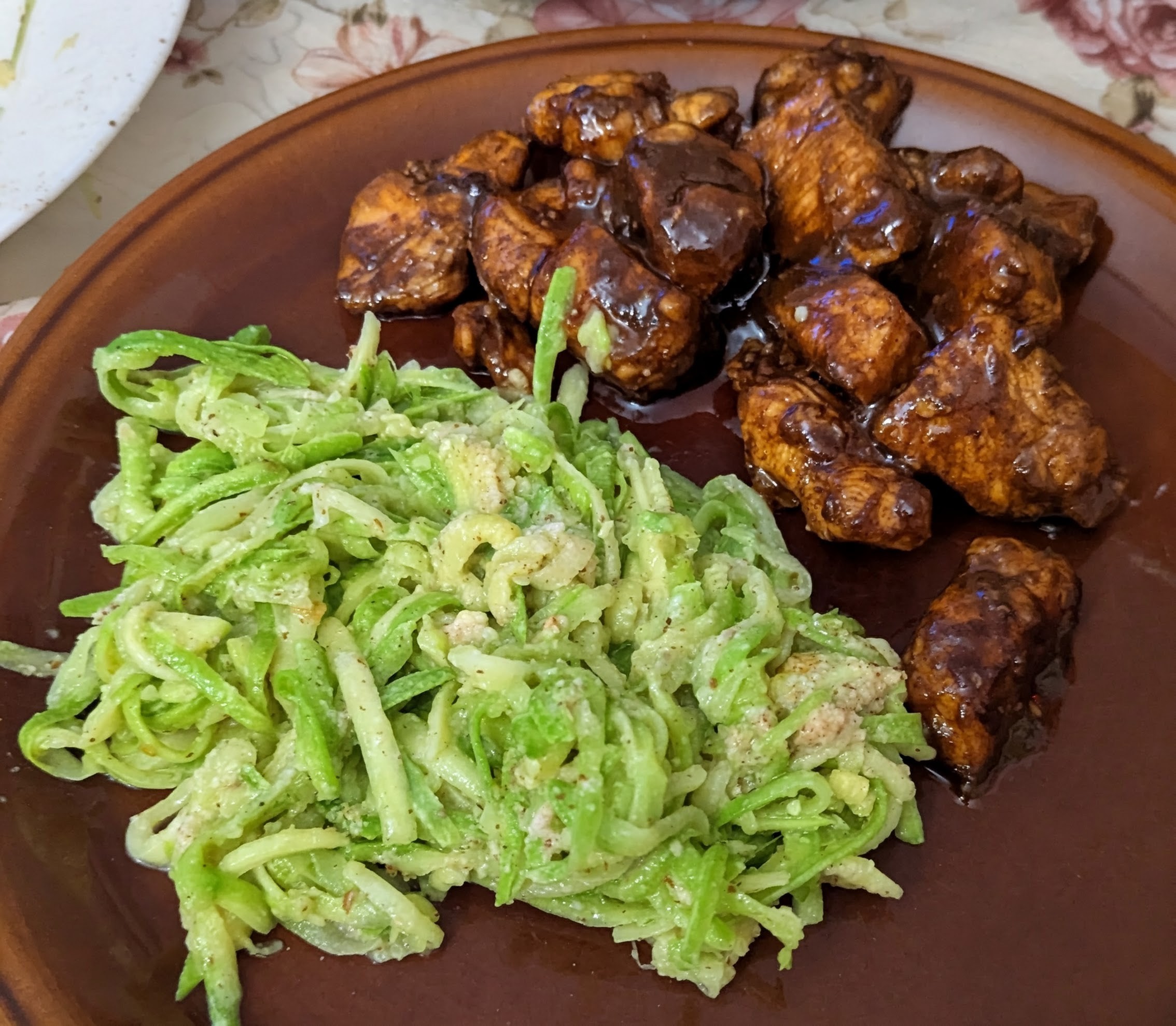 Madzun glazed chicken breast with zucchini almonds spirals 